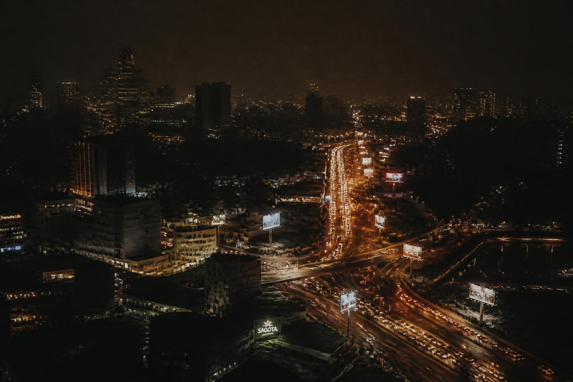 Ho Chi Minh City at night from above with traffic light trails