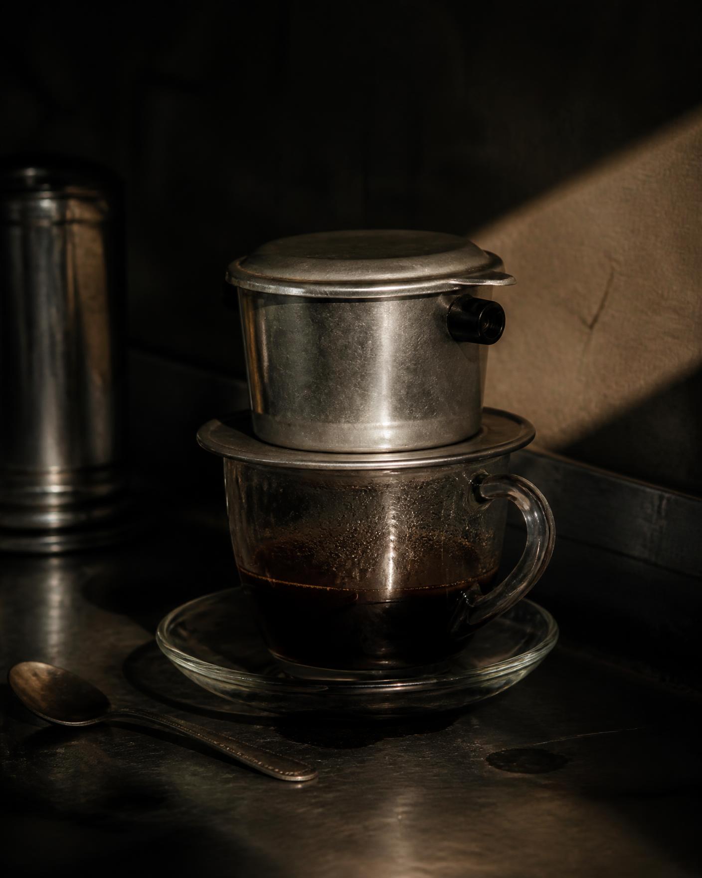 Vietnamese drip coffee in morning light